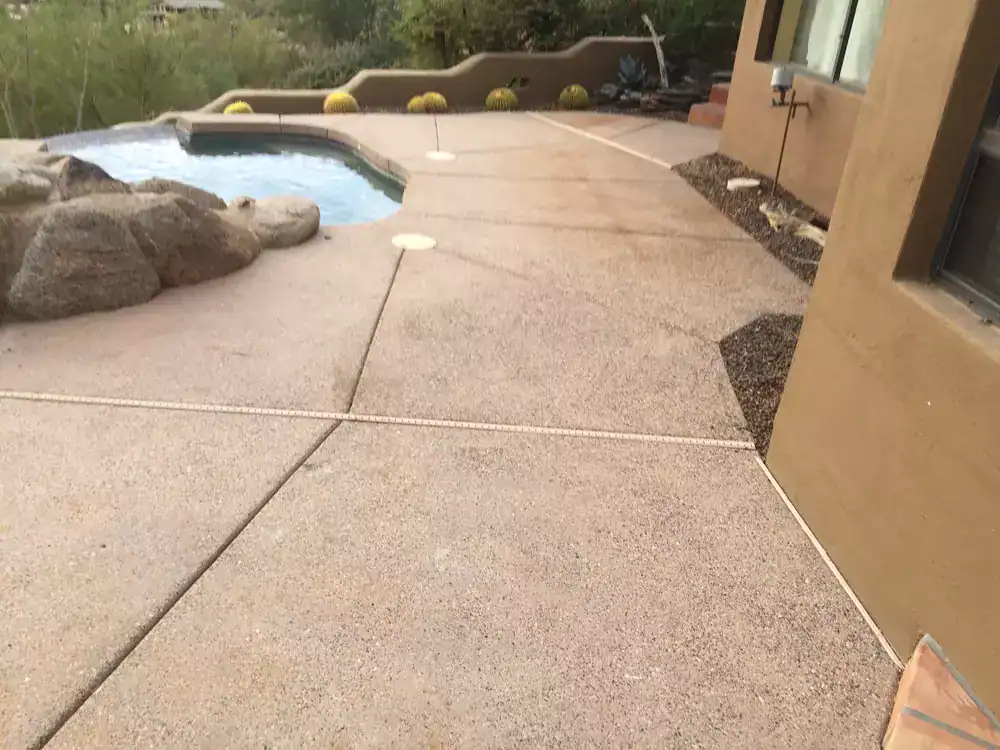 Severely Discolored Peeling Acrylic Decking