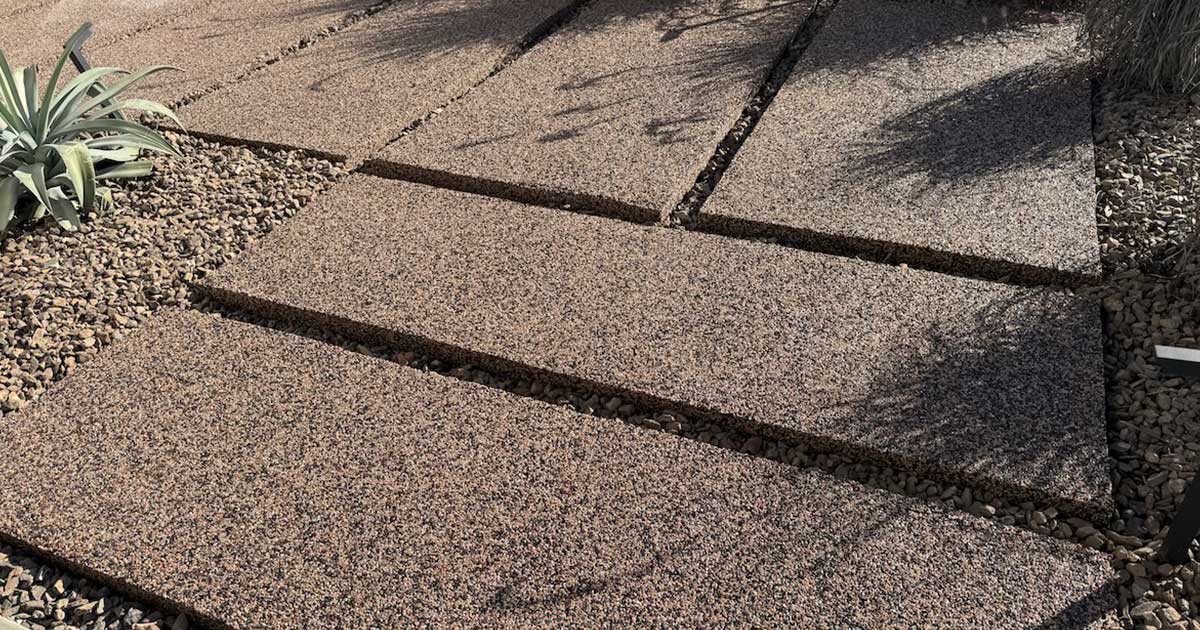 Pebble Stone Pool Decking Around a Custom Backyard Pool (Arizona)
